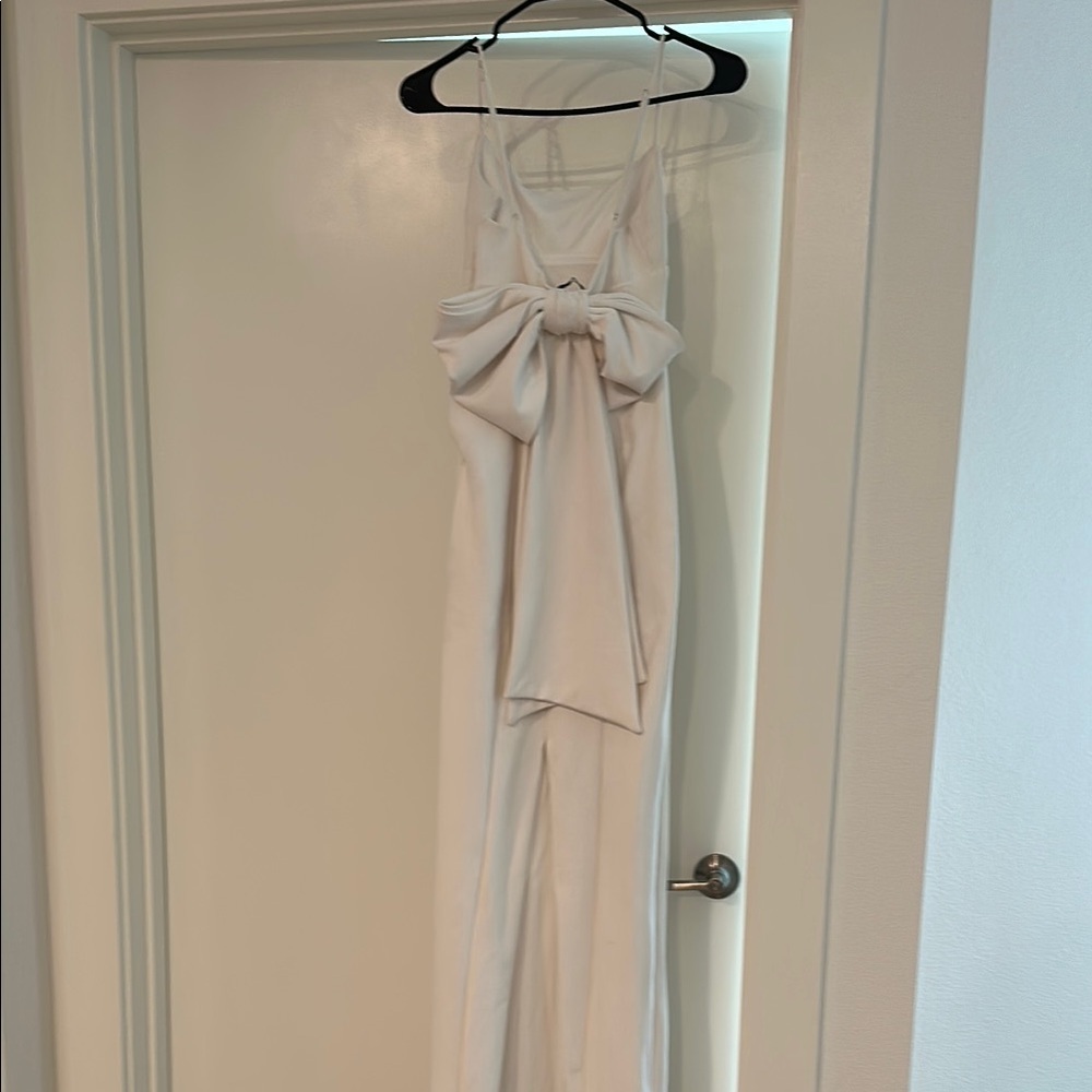 Elegant White Jumpsuit with Bow Detail